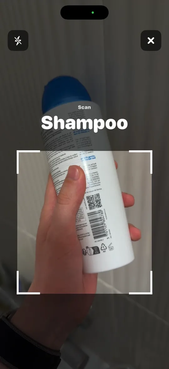 BarLock screenshot of the live camera scanner locked on a shampoo bottle barcode
